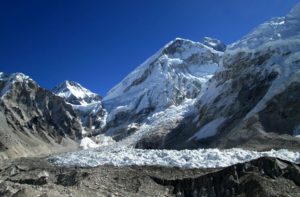 Mount Everest base camp south 5360 meters is the highest point of Everest base camp trek and the beginning of Everest expedition summit from Nepal. Determine how long does it take to get to the Everest base camp? Everest base camp height & temperature during EBC journey, Himalayas, Nepal, in Asia.